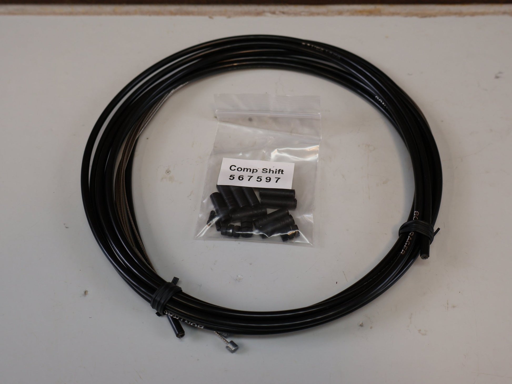 Zubehör von Bontrager, BONTRAGER COMP SCHALTZUG SET / ZUGHÜLLEN KIT EDELSTAHL / SHIMANO SRAM UNIVERSAL vor USEDBIKES-OB.DE Hintergrund