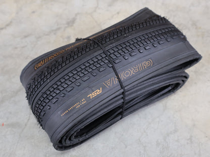 Reifen von Bontrager, BONTRAGER GIRONA RSL GR TLR GRAVELREIFEN / 700C – 35 / 38 / 42 MM – TUBELESS READY – BLACK vor USEDBIKES - OB.DE Hintergrund