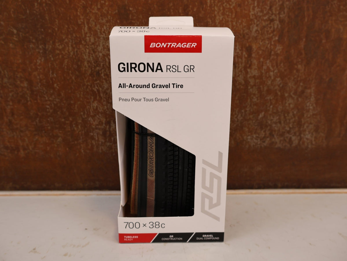 Reifen von Bontrager, Bontrager Girona RSL GR TLR Gravelreifen 700x38C Tanwall vor USEDBIKES-OB.DE Hintergrund