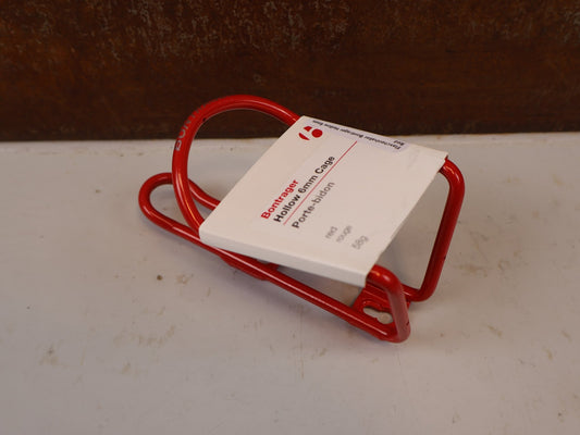 Trinkflaschen und Halter von Bontrager, BONTRAGER HOLLOW 6MM FLASCHENHALTER ALU RED ROT vor USEDBIKES-OB.DE Hintergrund