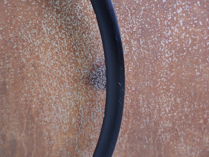 Zubehör von Bontrager, BONTRAGER PARADIGM TLR DISC 700C FELGE 28 LOCH vor USEDBIKES-OB.DE Hintergrund