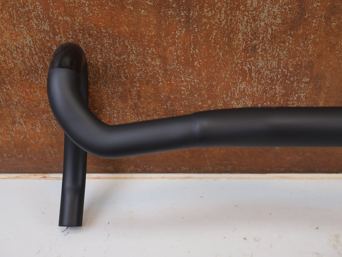 Lenker von Bontrager, Bontrager Pro Riser Carbon Rennradlenker 31.8mm 20mm Rise vor USEDBIKES-OB.DE Hintergrund
