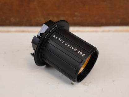 Zubehör von Bontrager, BONTRAGER RAPID DRIVE FREILAUFKÖRPER SHIMANO HG 11-FACH HAN 561658 vor USEDBIKES-OB.DE Hintergrund