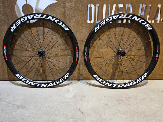 Laufrad/Laufradsatz von Bontrager, BONTRAGER XXX 4 TLR CLINCHER LAUFRADSATZ DISC vor USEDBIKES - OB.DE Hintergrund