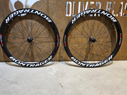 Laufrad/Laufradsatz von Bontrager, BONTRAGER XXX 4 TLR CLINCHER LAUFRADSATZ DISC vor USEDBIKES - OB.DE Hintergrund