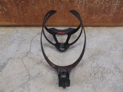 Trinkflaschen und Halter von Bontrager, BONTRAGER XXX FLASCHENHALTER / OCLV CARBON / SCHWARZ MATT – 20 G vor USEDBIKES - OB.DE Hintergrund