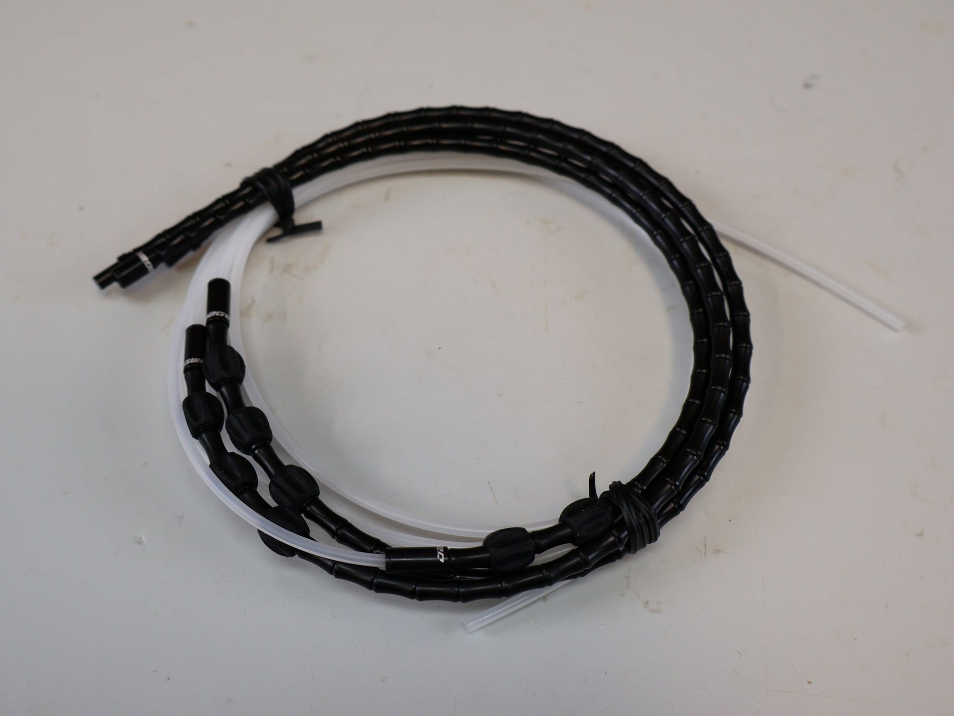 Zubehör von Bontrager, BONTRAGER XXX SCHALTZUG SET / LIGHTWEIGHT ALUMINIUM LINK KIT / SHIMANO SRAM UNIVERSAL vor USEDBIKES-OB.DE Hintergrund