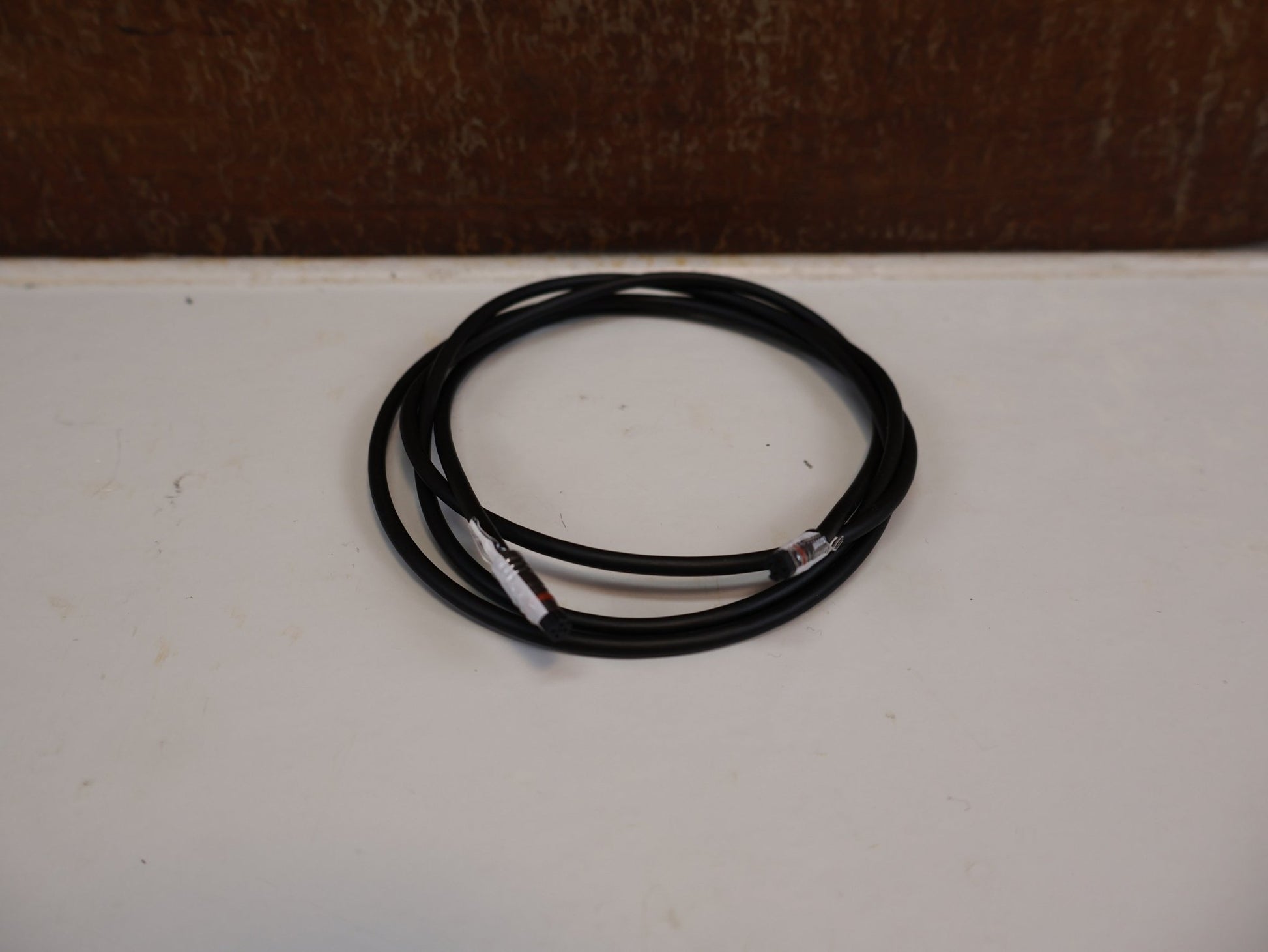 Zubehör von Bosch, BOSCH DISPLAY - KABEL HMI BCH3611_1300 SMARTES SYSTEM / 1300 MM / EB12120006 vor USEDBIKES - OB.DE Hintergrund