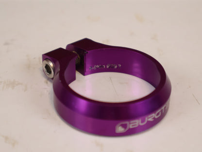 Zubehör von Burgtec, Burgtec Sattelklemme 39.7mm Purple Rain MTB 10574 vor USEDBIKES-OB.DE Hintergrund