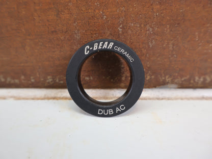 Innenlager von C-Bear, C-BEAR DUB DUST COVER ERSATZ ABDECKUNG KERAMIK INNENLAGER 2 STÜCK vor USEDBIKES-OB.DE Hintergrund