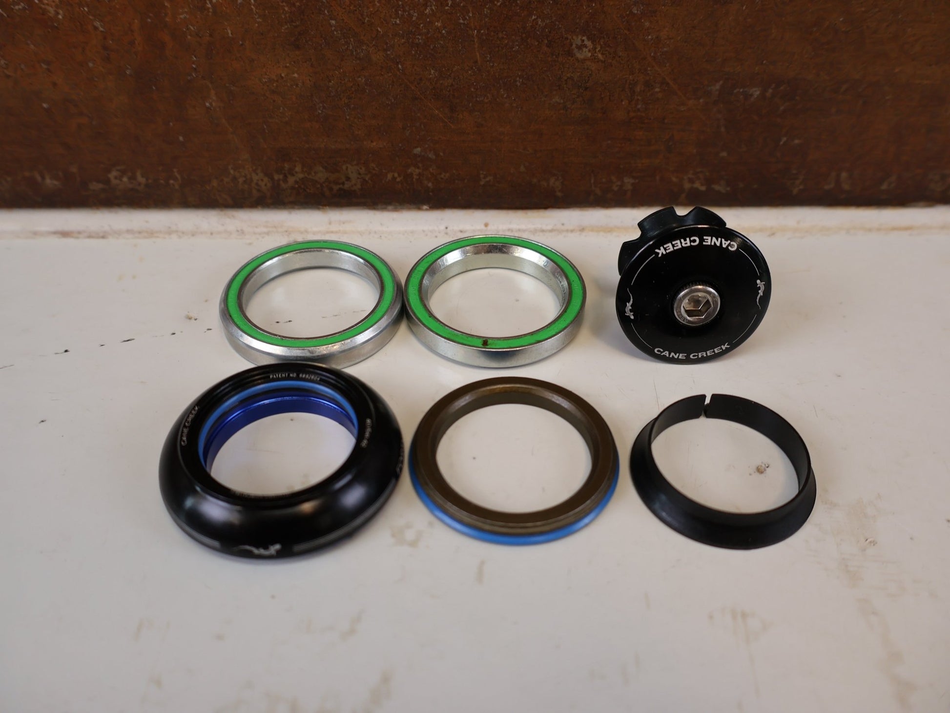 Zubehör von Cane Creek, CANE CREEK 40 IS41 SHORT COVER STEUERSATZ 1 1 8 vor USEDBIKES-OB.DE Hintergrund