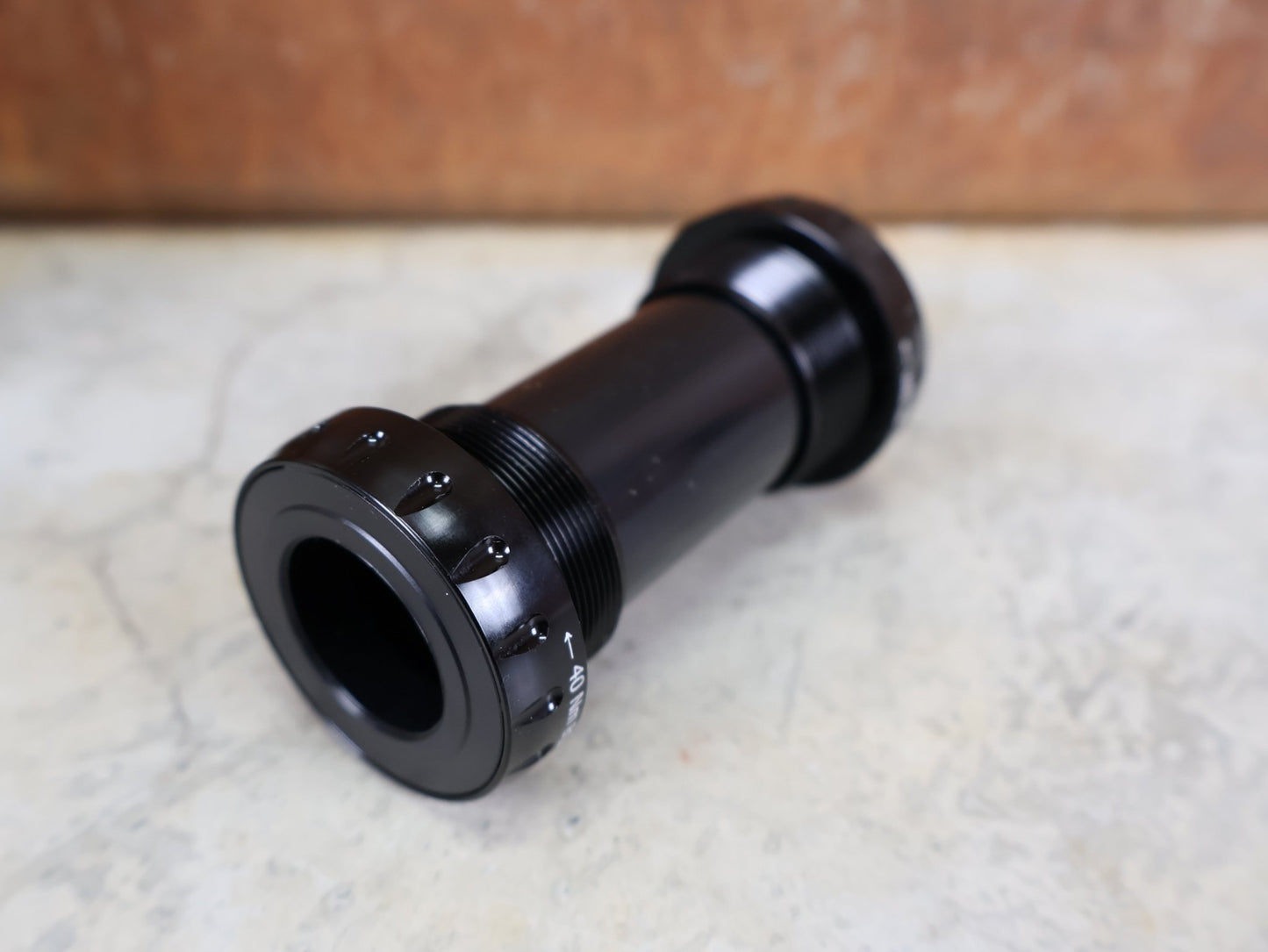 Innenlager von Ceramicspeed, CERAMICSPEED BSA INNENLAGER SHIMANO ROAD / 68 MM – 24 MM ACHSE – COATED LAGER vor USEDBIKES - OB.DE Hintergrund