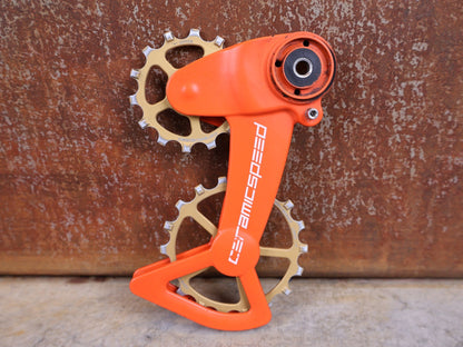 Schaltungsteile von Ceramicspeed, CERAMICSPEED OSPW X FÜR SRAM EAGLE AXS – COATED / ORANGE–BRONZE CERAKOTE vor USEDBIKES - OB.DE Hintergrund