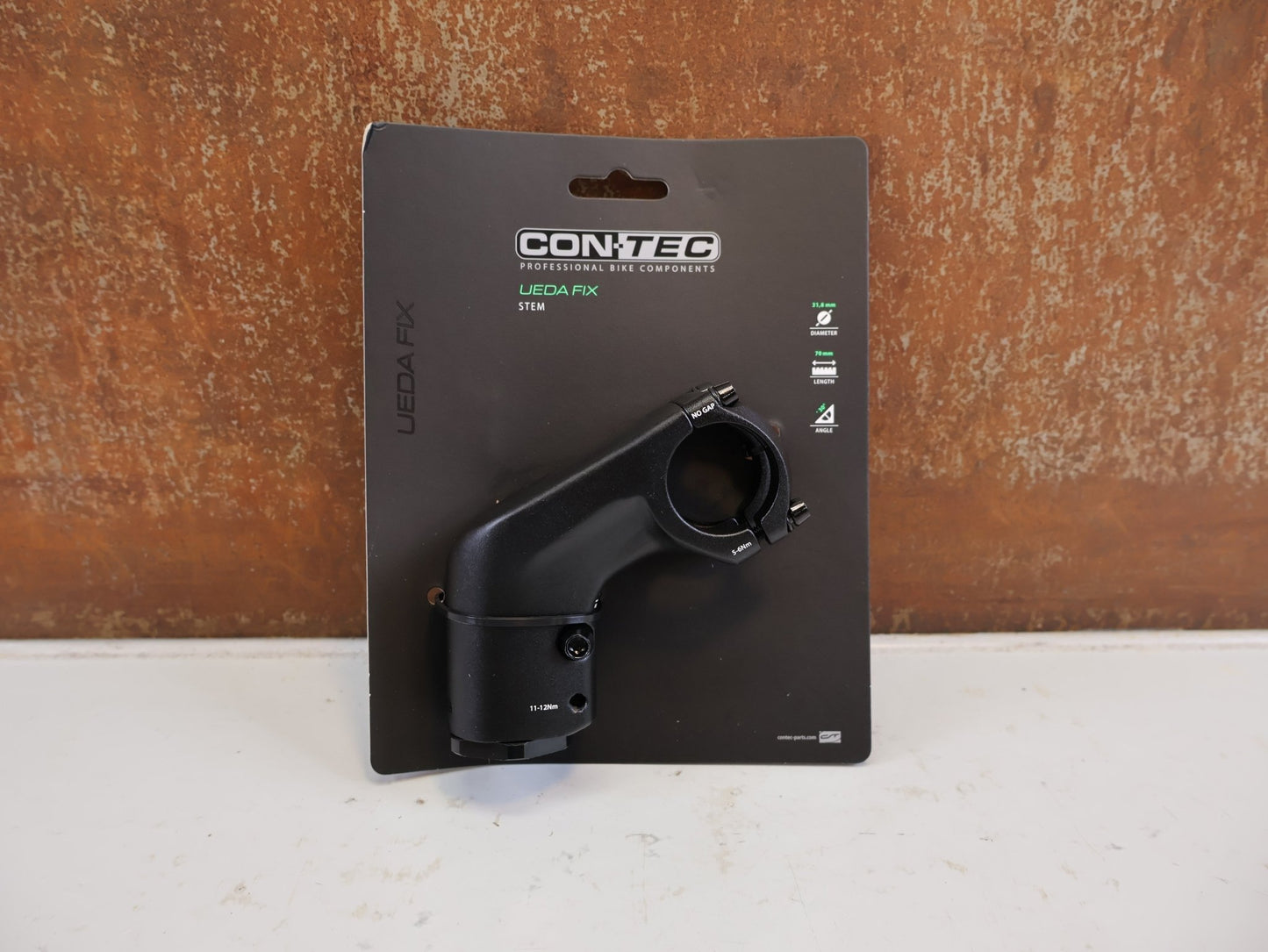 Vorbau von Contec, CONTEC UEDA FIX VORBAU AHEAD 31.8 MM 70 MM 30 GRAD vor USEDBIKES-OB.DE Hintergrund