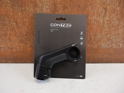 Vorbau von Contec, CONTEC UEDA FIX VORBAU AHEAD 31.8 MM 90 MM 30 GRAD vor USEDBIKES-OB.DE Hintergrund