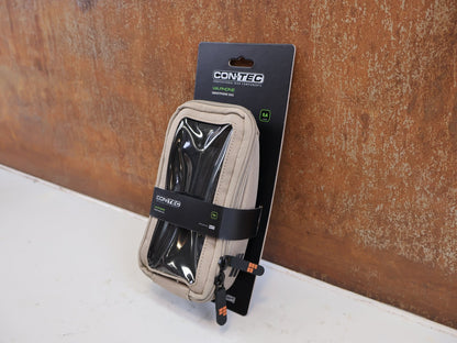 Taschen & Rucksäcke von Contec, CONTEC VIA PHONE SMARTPHONETASCHE 0.6L DESERT SAND vor USEDBIKES-OB.DE Hintergrund