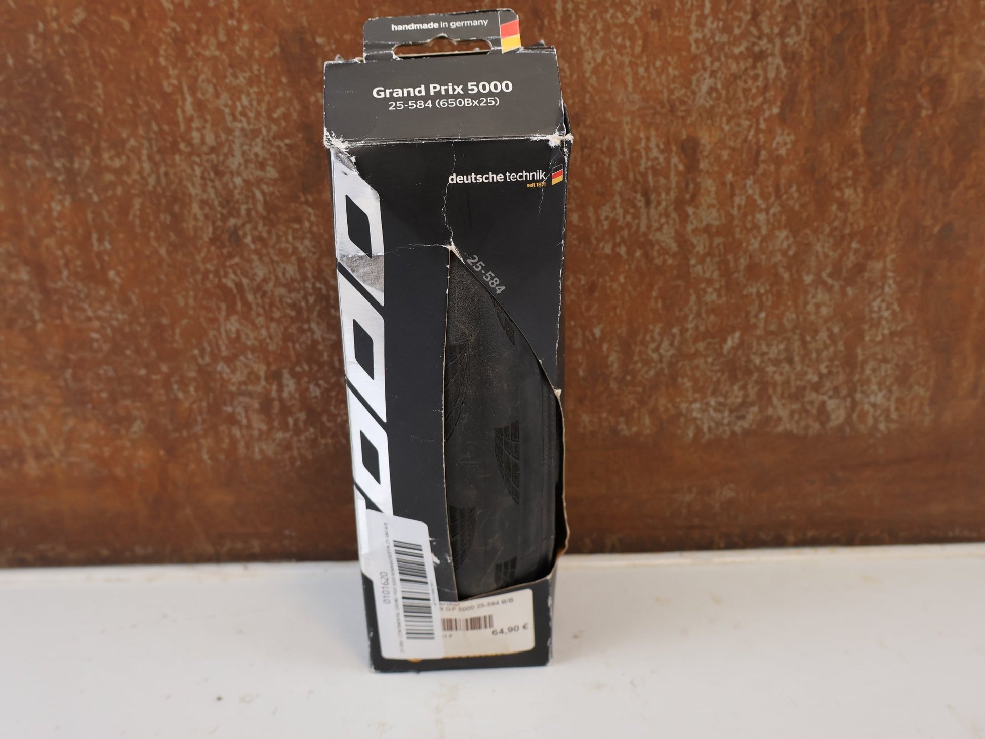 Reifen von Continental, CONTINENTAL GRAND PRIX 5000 RENNRADREIFEN 25-584 B/B vor USEDBIKES-OB.DE Hintergrund