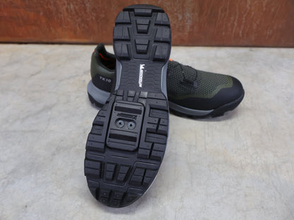 MTB - Herrenschuhe von Dmt, DMT TK10 MOUNTAINBIKESCHUH / GRÜN / SCHWARZ / UNISEX vor USEDBIKES - OB.DE Hintergrund