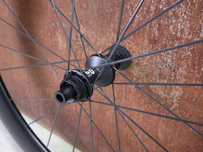 Laufrad/Laufradsatz von Dt Swiss, DT SWISS ARC 1000 62MM LAUFRADSATZ DISC vor USEDBIKES - OB.DE Hintergrund