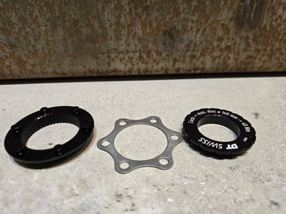 Zubehör von Dt Swiss, DT SWISS CENTER LOCK ADAPTER DISC MAX. 160MM in variant_title vor USEDBIKES - OB.DE Hintergrund