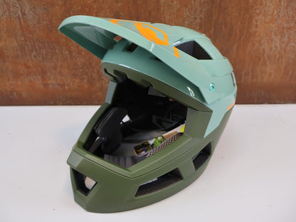 Helme von Endura, ENDURA SINGLETRACK / MIPS FULLFACE HELM / GR. L-XL 58-63 CM / OLIVGRÜN vor USEDBIKES-OB.DE Hintergrund