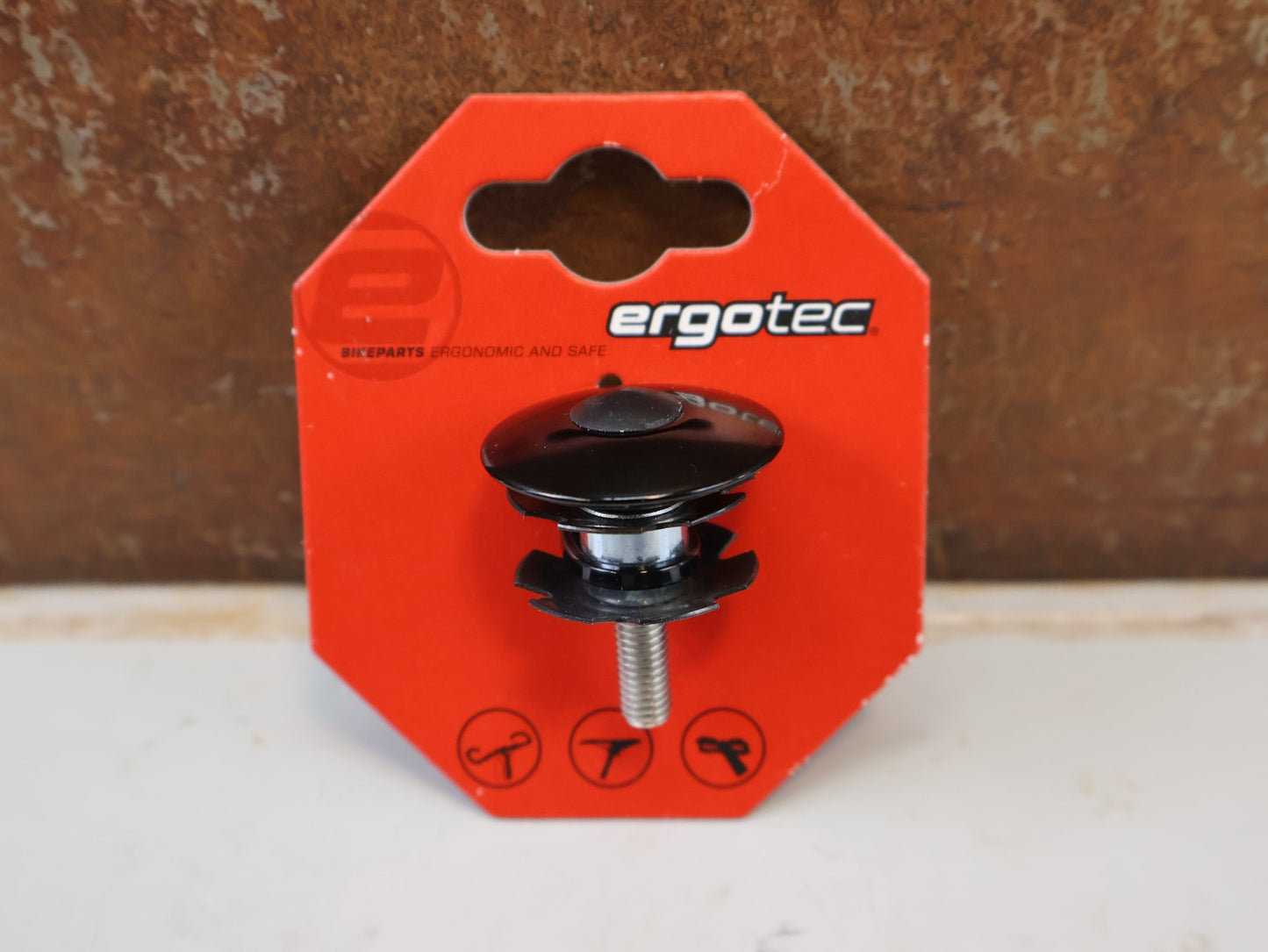 Zubehör von Ergotec, ERGOTEC AHEAD-KRALLE CONIX / 1 1/8 ZOLL GABELSCHAFT EINSTELLKLEMME vor USEDBIKES-OB.DE Hintergrund