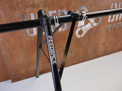 Fahrradständer von Feedback Sports, FEEDBACK SPORTS A FRAME PORTABLE EVENT STAND TRAGETASCHE vor USEDBIKES-OB.DE Hintergrund