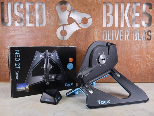 Rollentrainer & Zubehör von Garmin, GARMIN TACX NEO 2T SMART TRAINER T2875 / SRAM XD - R & SHIMANO HG vor USEDBIKES - OB.DE Hintergrund