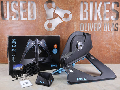 Rollentrainer & Zubehör von Garmin, GARMIN TACX NEO 2T SMART TRAINER T2875 / SRAM XD - R & SHIMANO HG vor USEDBIKES - OB.DE Hintergrund