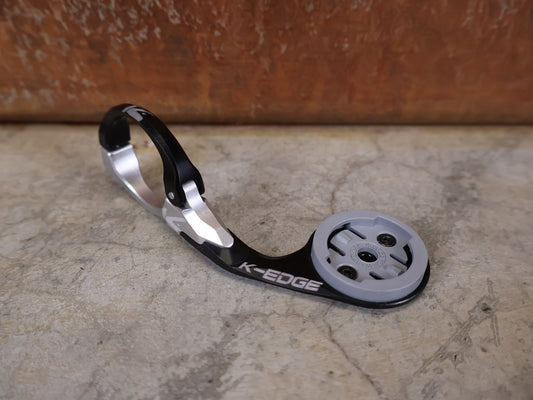 Computerhalterung von K - Edge, K - EDGE PRO RACE MOUNT COMPUTERMOUNT 31,8MM / WAHOO vor USEDBIKES - OB.DE Hintergrund