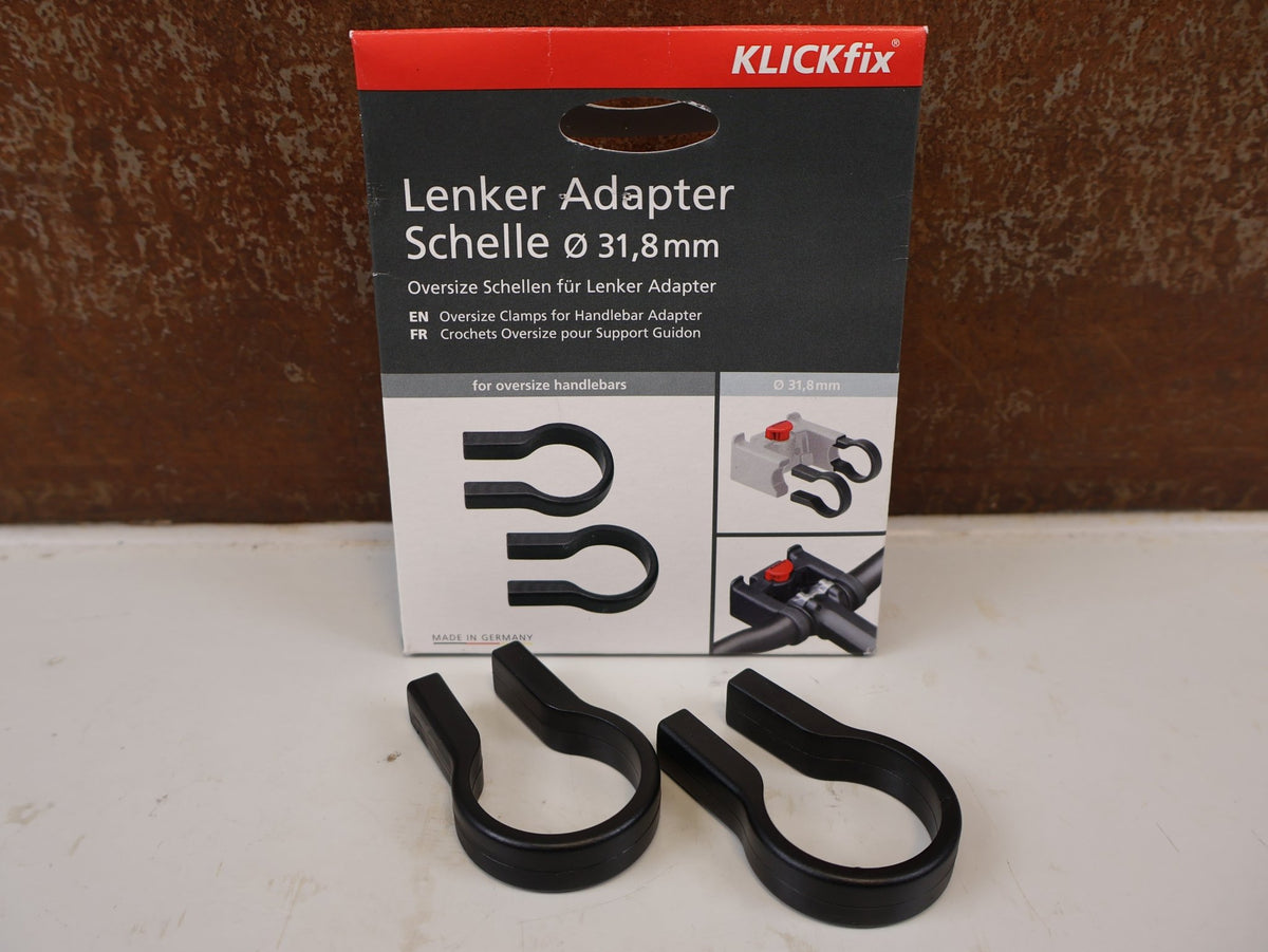 Lenker von Klickfix, KLICKFIX LENKER ADAPTER SCHELLE 31,8 MM OVERSIZE vor USEDBIKES-OB.DE Hintergrund