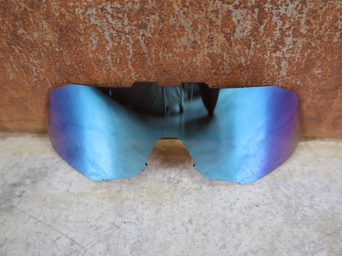 Brillen Zubehör & Ersatzteile von Koo, KOO DEMOS LENS ERSATZGLAS – RED BULL BORA HANSGROHE EDITION – TURQUOISE MIRROR vor USEDBIKES - OB.DE Hintergrund