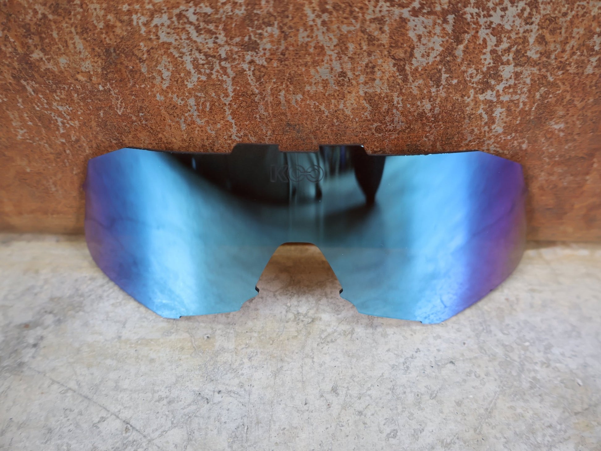 Brillen Zubehör & Ersatzteile von Koo, KOO DEMOS LENS ERSATZGLAS – RED BULL BORA HANSGROHE EDITION – TURQUOISE MIRROR vor USEDBIKES - OB.DE Hintergrund
