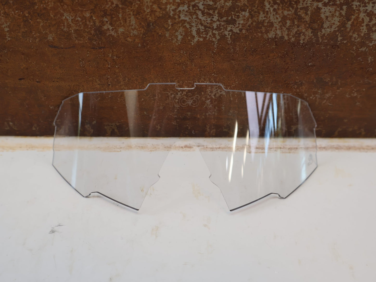 Brillen Zubehör & Ersatzteile von Koo, KOO SPECTRO LENS ERSATZGLAS / PHOTOCHROMIC CLEAR BORA HANSGROHE EDITION vor USEDBIKES-OB.DE Hintergrund
