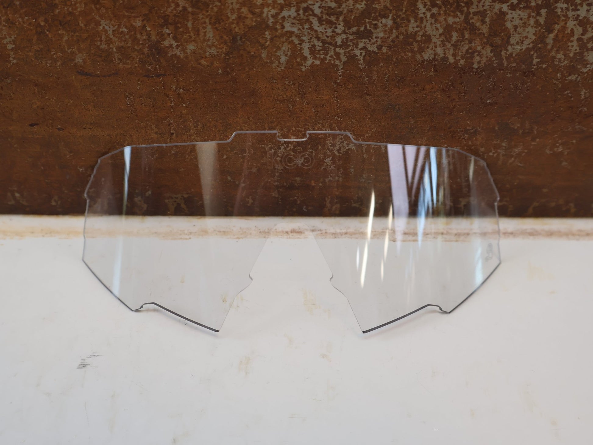 Brillen Zubehör & Ersatzteile von Koo, KOO SPECTRO LENS ERSATZGLAS / PHOTOCHROMIC CLEAR BORA HANSGROHE EDITION vor USEDBIKES-OB.DE Hintergrund