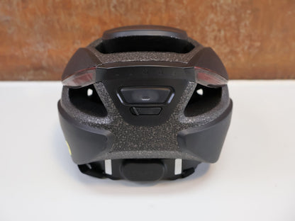 Helme von lumos, LUMOS ULTRA MIPS SMART - HELM / GR. M - L (54 - 61CM) / LED - BLINKER / IPX6 / SCHWARZ vor USEDBIKES - OB.DE Hintergrund