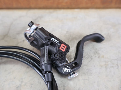 Bremse von Magura, MAGURA MT8 PRO / HYDRAULISCHE SCHEIBENBREMSE / CARBOTECTURE SL / FLIP - FLOP / 240 G vor USEDBIKES - OB.DE Hintergrund