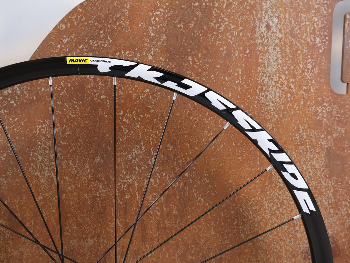 Laufrad/Laufradsatz von Mavic, MAVIC CROSSRIDE FTS X 27.5 ZOLL HR 9X135MM SHIMANO HG vor USEDBIKES-OB.DE Hintergrund