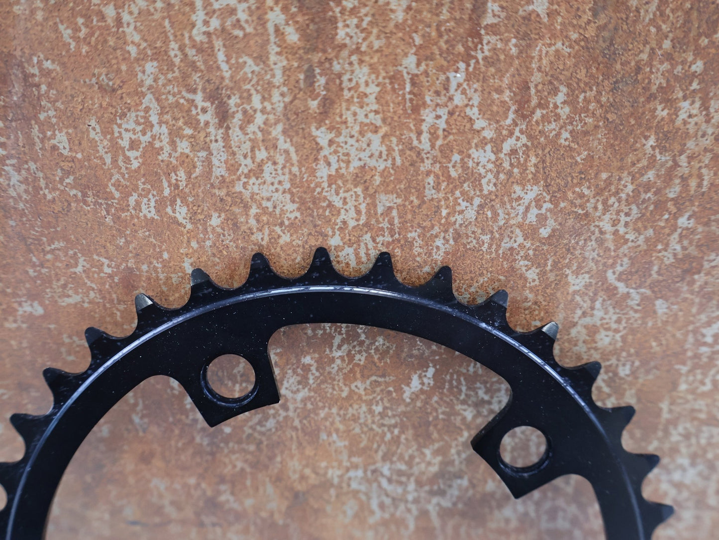 Kettenblatt von Miche, MICHE SUPER11 SSC KETTENBLATT / INNER / 110 MM / 38 ZÄHNE / SHIMANO 11 - FACH vor USEDBIKES - OB.DE Hintergrund