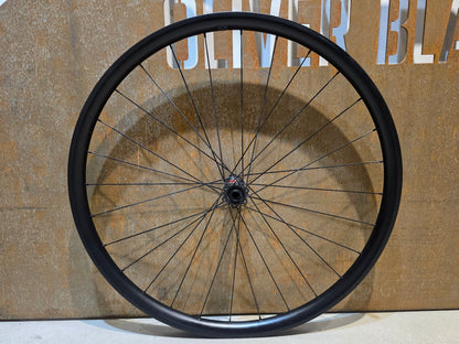 Laufrad/Laufradsatz von Mse, MSE 29 ZOLL CARBON LAUFRADSATZ BOOST 6 - LOCH DISC vor USEDBIKES - OB.DE Hintergrund