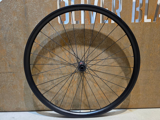 Laufrad/Laufradsatz von Mse, MSE 29 ZOLL CARBON LAUFRADSATZ BOOST 6 - LOCH DISC vor USEDBIKES - OB.DE Hintergrund