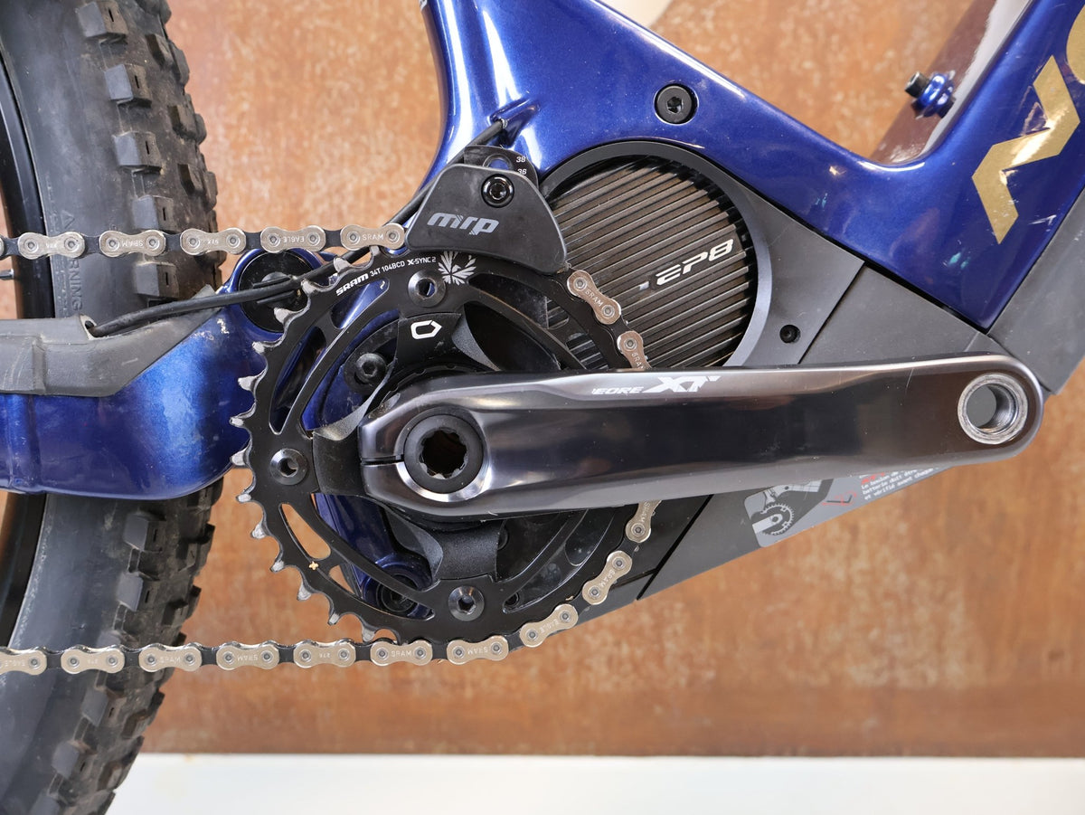E-Mountainbike von Norco, Norco Sight VLT C1 Shimano EP8 900Wh Fox 36 160mm / XL vor USEDBIKES-OB.DE Hintergrund