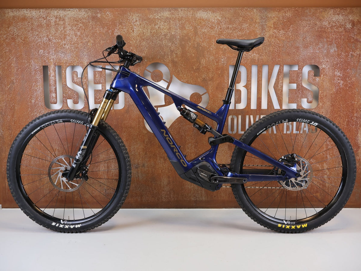 E-Mountainbike von Norco, Norco Sight VLT C1 Shimano EP8 900Wh Fox 36 160mm / XL vor USEDBIKES-OB.DE Hintergrund