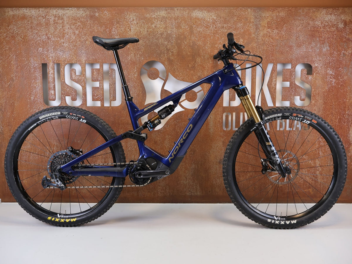 E-Mountainbike von Norco, Norco Sight VLT C1 Shimano EP8 900Wh Fox 36 160mm / XL vor USEDBIKES-OB.DE Hintergrund