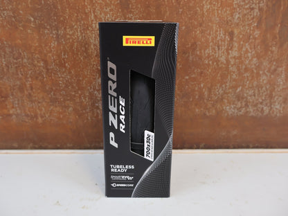 Reifen von Pirelli, Pirelli P ZERO Race TLR Rennradreifen 700C Schwarz 28-32mm vor USEDBIKES-OB.DE Hintergrund