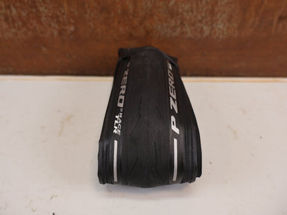 Reifen von Pirelli, Pirelli P ZERO Race TLR Rennradreifen 700C Schwarz 28-32mm vor USEDBIKES-OB.DE Hintergrund