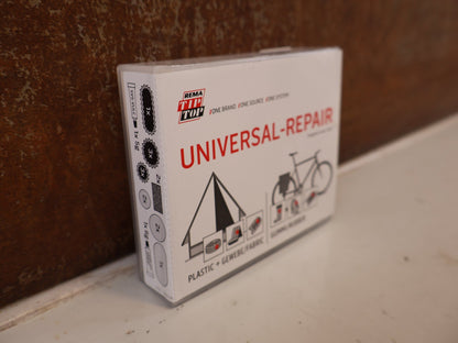 Pflege & Wartung von Rema, REMA TIP TOP UNIVERSAL REPARATURSET FLICKBOX PU PVC vor USEDBIKES-OB.DE Hintergrund