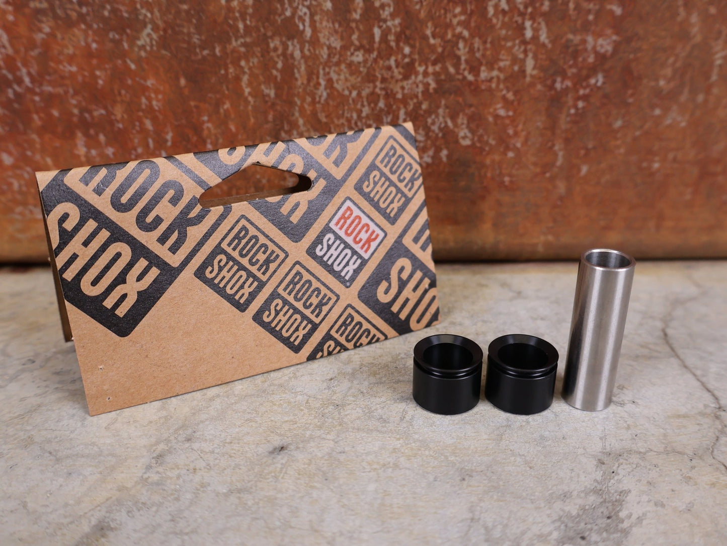 Zubehör von Rock Shox, ROCKSHOX – GLEITADAPTER / FÜHRUNGSBUCHSEN 10 × 40 MM (00.4118.091.012) vor USEDBIKES - OB.DE Hintergrund