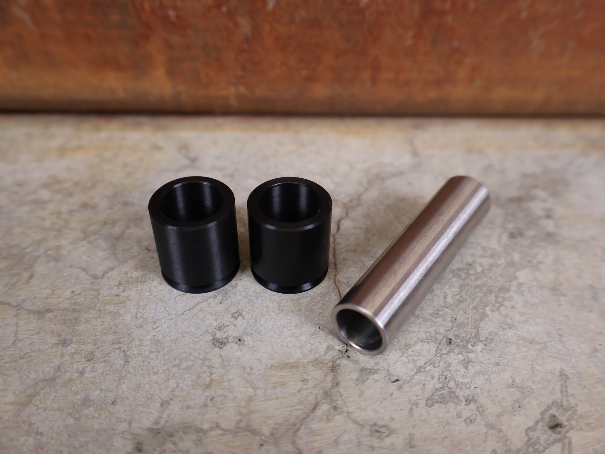 Zubehör von Rock Shox, ROCKSHOX – GLEITADAPTER / FÜHRUNGSBUCHSEN 10 × 50 MM (00.4118.091.015) vor USEDBIKES - OB.DE Hintergrund