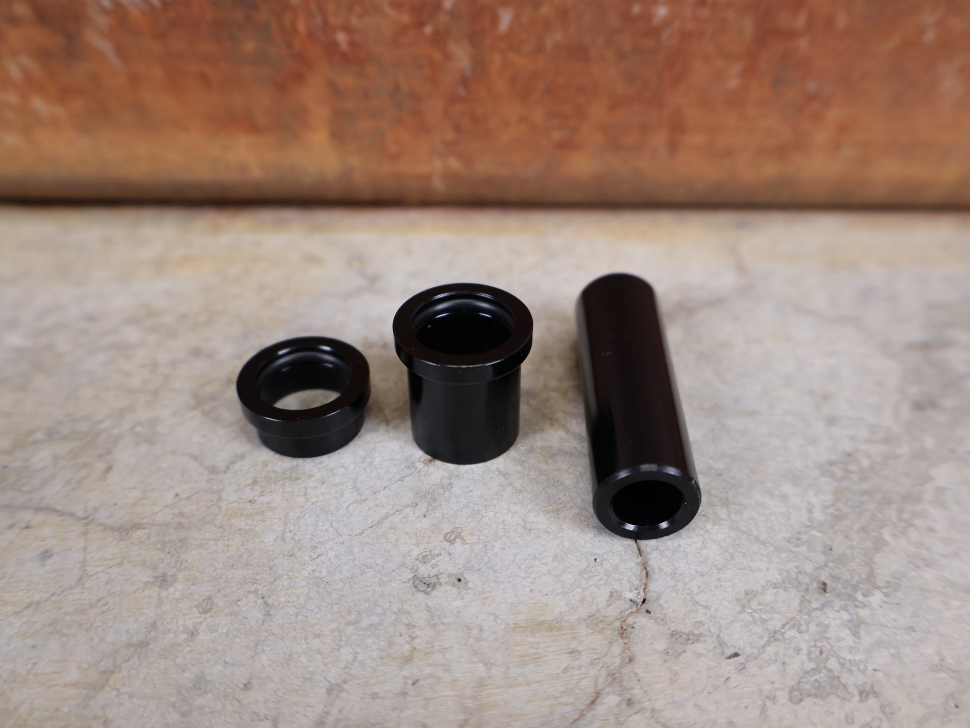 Zubehör von Rock Shox, ROCKSHOX – GLEITADAPTER / FÜHRUNGSBUCHSEN 8 × 40 MM (00.4118.159.027) vor USEDBIKES - OB.DE Hintergrund